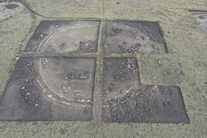 Fig. 1: View of the sanctuary of Nazarlebi from the south (photo G. Kirkitadze). Plateau sections (PS) 3 and 5 in front, PS 2 and 4 in the back (from the west). 
The area left out by the excavation contains the concreted trigonometric point.